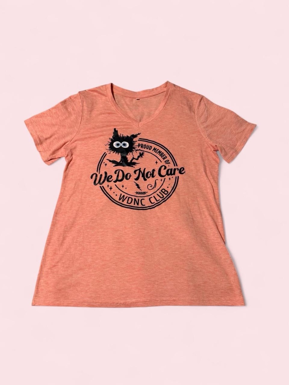We Do Not Care Peach Cat Graphic V-Neck Tee